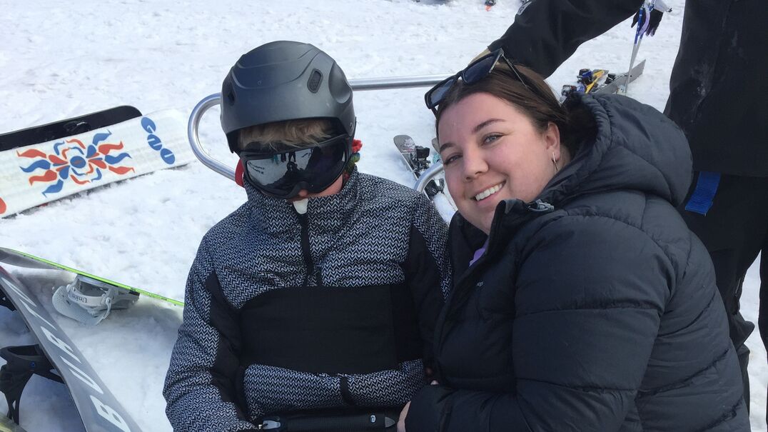Inlife client Tom and support worker Megan on a snow trip at Falls Creek.